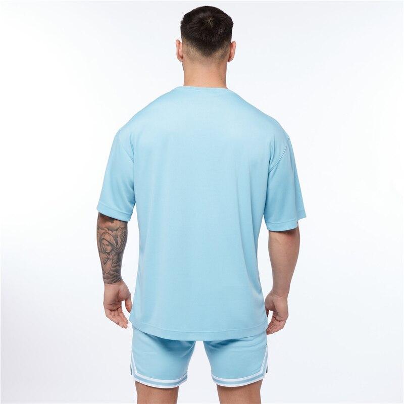 Muscleguys Oversized Short Sleeved T-shirt Men's Loose Fitness Breathable Top