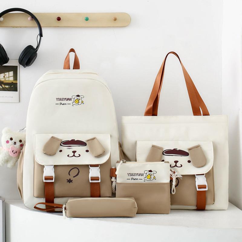 School bag new cartoon cute primary school schoolbag four-piece large-capacity middle school student backpack burden reduction casual backpack women