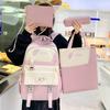 Junior high school backpack women's large-capacity four-piece set middle school student backpack high-value college student schoolbag