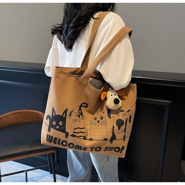 Casual large-capacity canvas bag women's new lightweight and versatile commuter shoulder bag portable tote bag