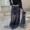 Retro American high street collision line design jeans women's autumn new Paris buckle loose versatile scimitar wide-leg pants