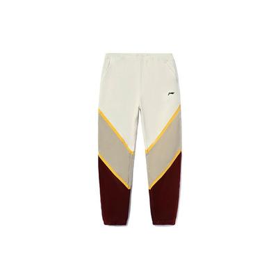 Li Ning CF Wu Xing Series Color Block Вышитый логотип Свободный крой Зауженные вельветовые повседневные брюки унисекс брюки Красно-кирпичный AYKR907-1