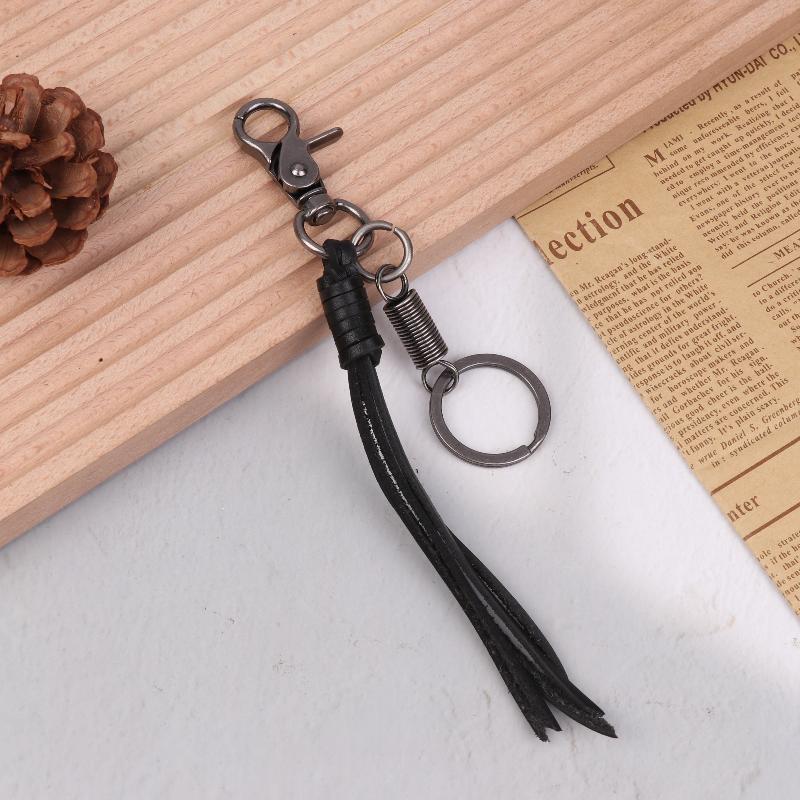 

Cowhide Tassel Key Chain Bag Charm Accessory Pu Leather Tassel Car Key Ring Fringe Jewelry Gift as the picture