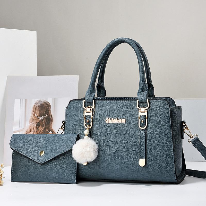 2 Stück Neue Handtasche mit großem Fassungsvermögen PU Wasserdichtes Mehrfach-Reißverschlussfach Schultertasche Temperament Pendler Vielseitig Pompon-Anhänger Umhängetasche