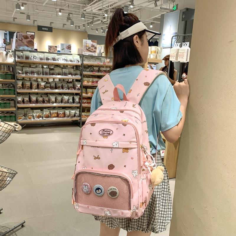 Schoolbag High-value schoolbag Female college student Cute transparent pain bag Large capacity computer backpack Versatile junior high school backpack