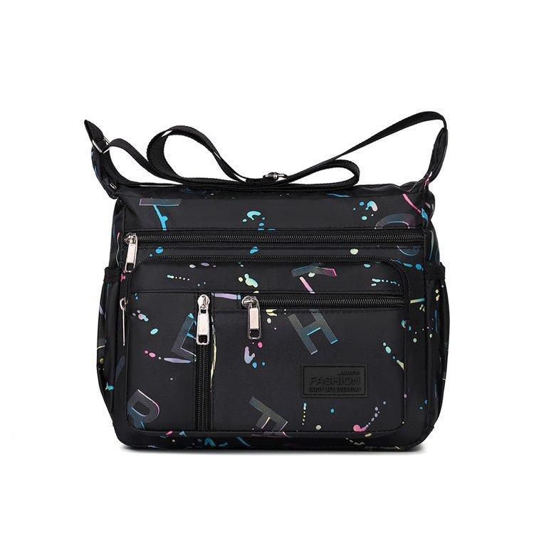 New Fashion Joker Shoulder Bag Large Capacity Letter Printing Leisure Travel Messenger Bag Multi Layer Storage Mother Bag.