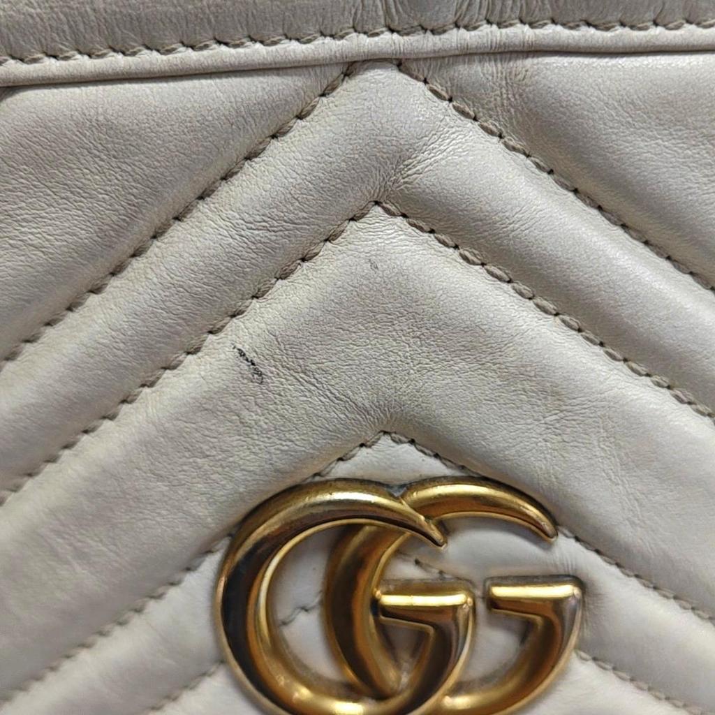 [Usato] Borsa a secchiello trapuntata GG Marmont con logo dorato, color block, coulisse e catena - Buono #CIIKN1