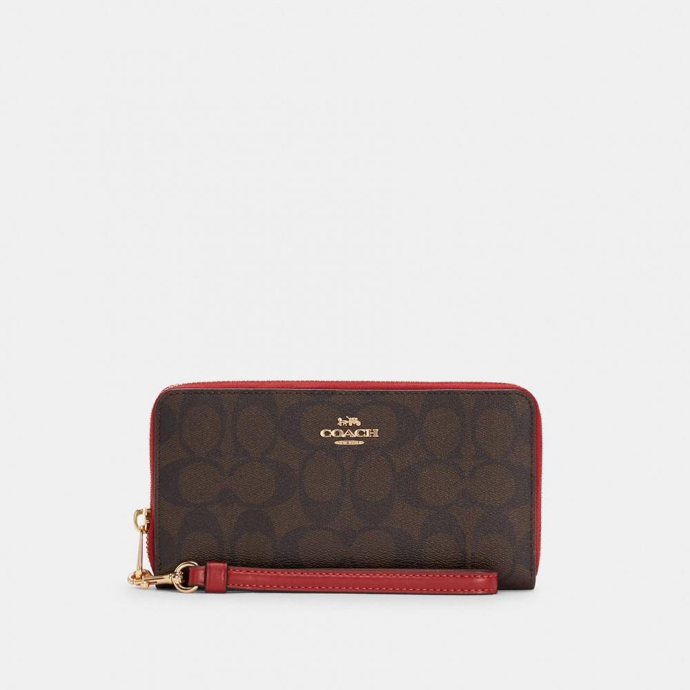 

Длинный кошелек Coach из фирменной канвы на молнии