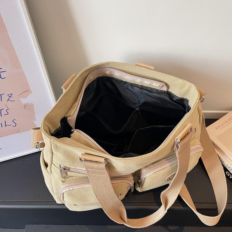 Stylish Canvas Shoulder Bag for Women, Multi-Pocket Tote with Adjustable Strap and Durable Design