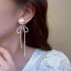 New temperament fringed bow earrings female, niche design handmade pearl Internet celebrity earrings earrings