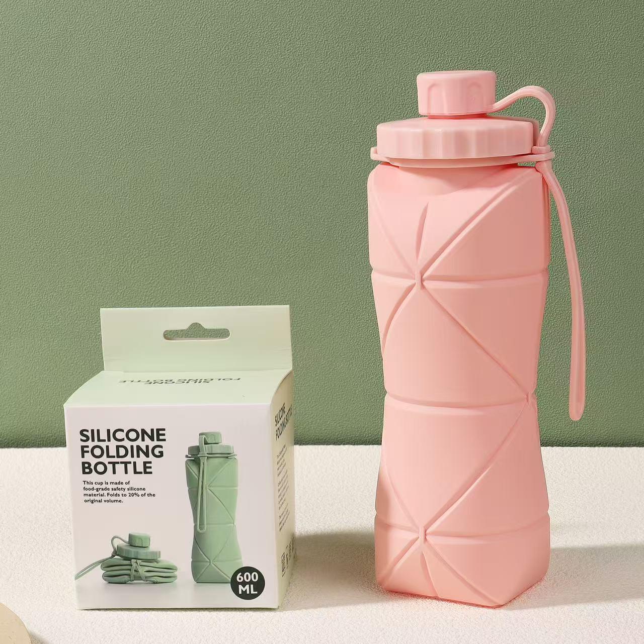 

Collapsible High-Temperature Resistant Silicone Water Bottle - Portable & Easy to Store for Outdoor Sports. 600 ml рожевий