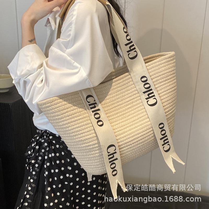 Woven Straw Bag Women's Large Capacity 2025 New Versatile Seaside Shoulder Bag Beach Vacation Commuter Tote Bag