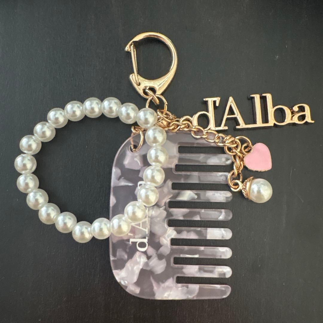 Used d Alba mini comb keychain
