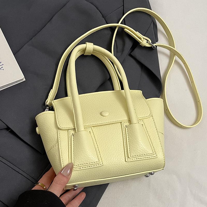 

Летний дофамин корейская версия простая и милая портативная сумка-ведро повседневный зарубежный стиль текстура с рисунком личи сумка-мессенджер для通勤