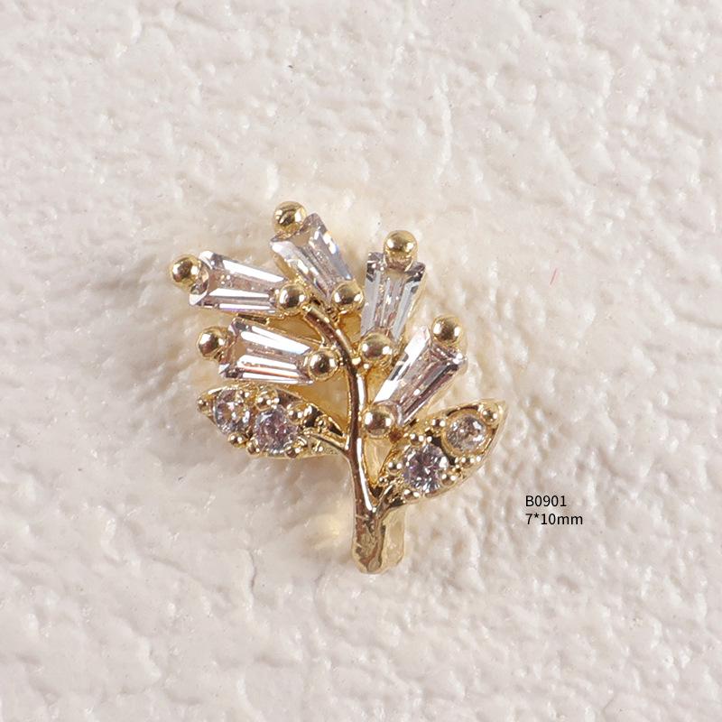 Trendiger Strass- und Zirkon-Nagelschmuck mit diamantbesetzten Metallpailletten