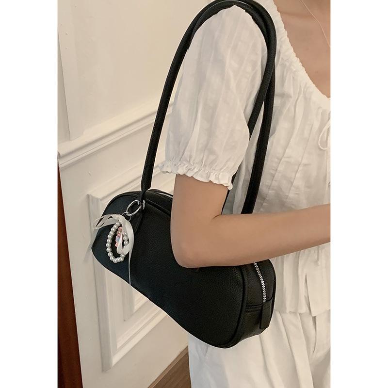 Niche texture portable bowling bag women's new fashion underarm bag simple and versatile shoulder bag
