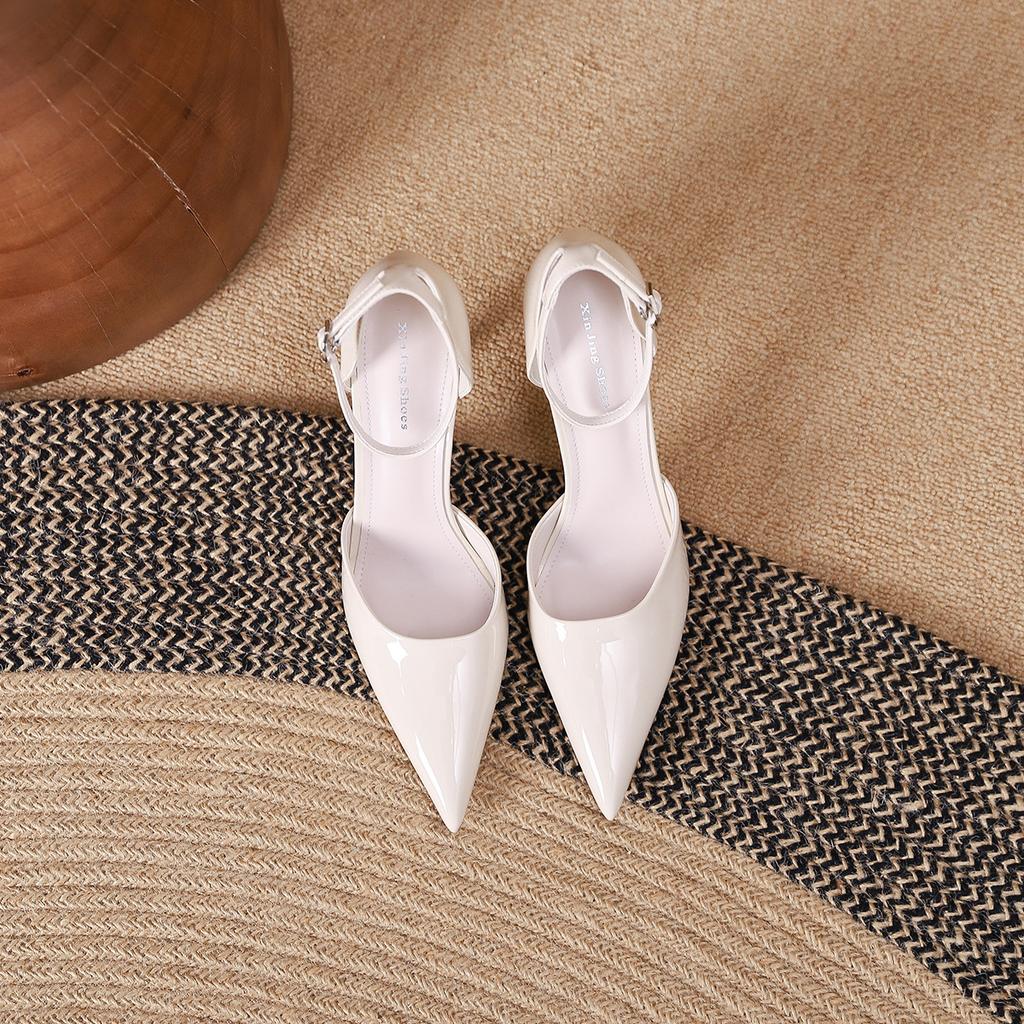 2199-2 European and American style simple hollow shallow mouth thin heel shoes new word with pointed high heel shoes