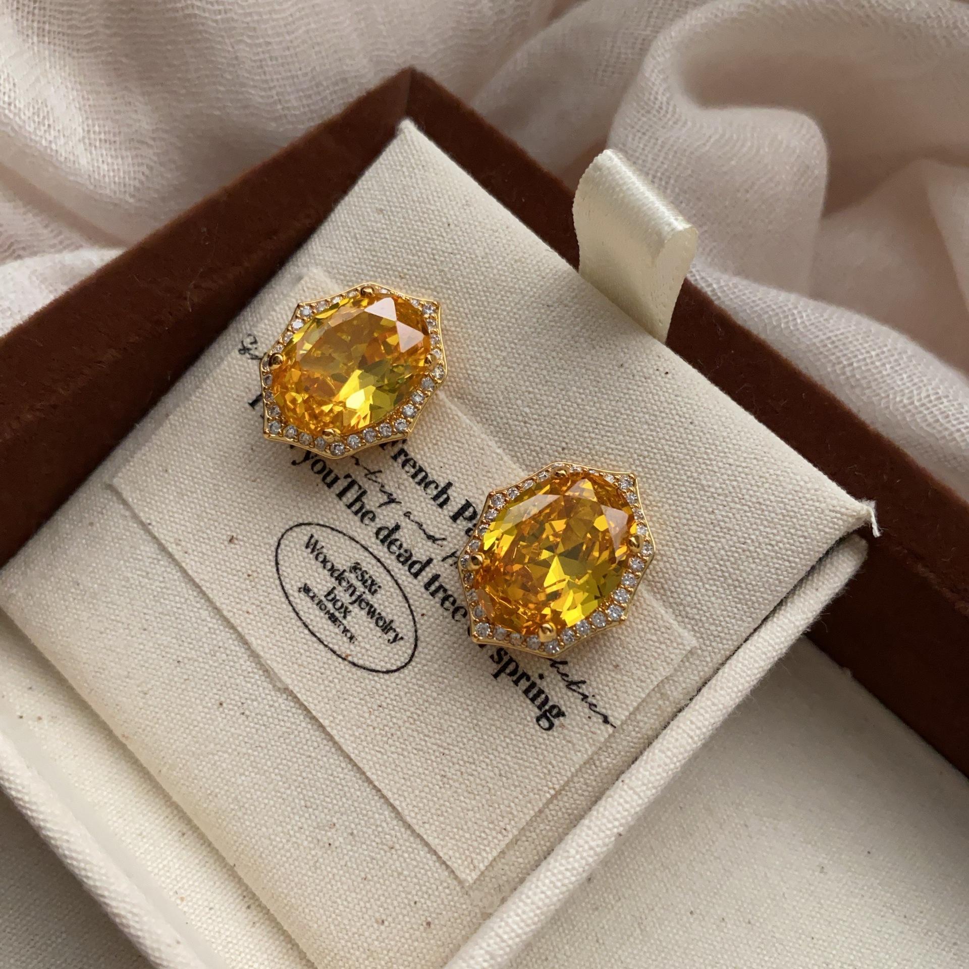

Light luxury jewelry heavy industry earrings women s micro-inlaid orange zircon luxury fashion temperament versatile earrings