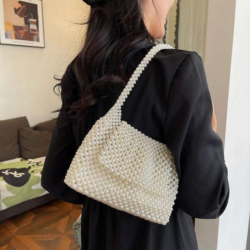 Nowa ręcznie robiona torebka na ramię z koralików damska osobowość wszechstronna modna torebka listonoszka na jedno ramię