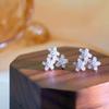 Boucles d'oreilles trois fleurs passe-partout pour femmes avec design de niche et nouvelles boucles d'oreilles douces