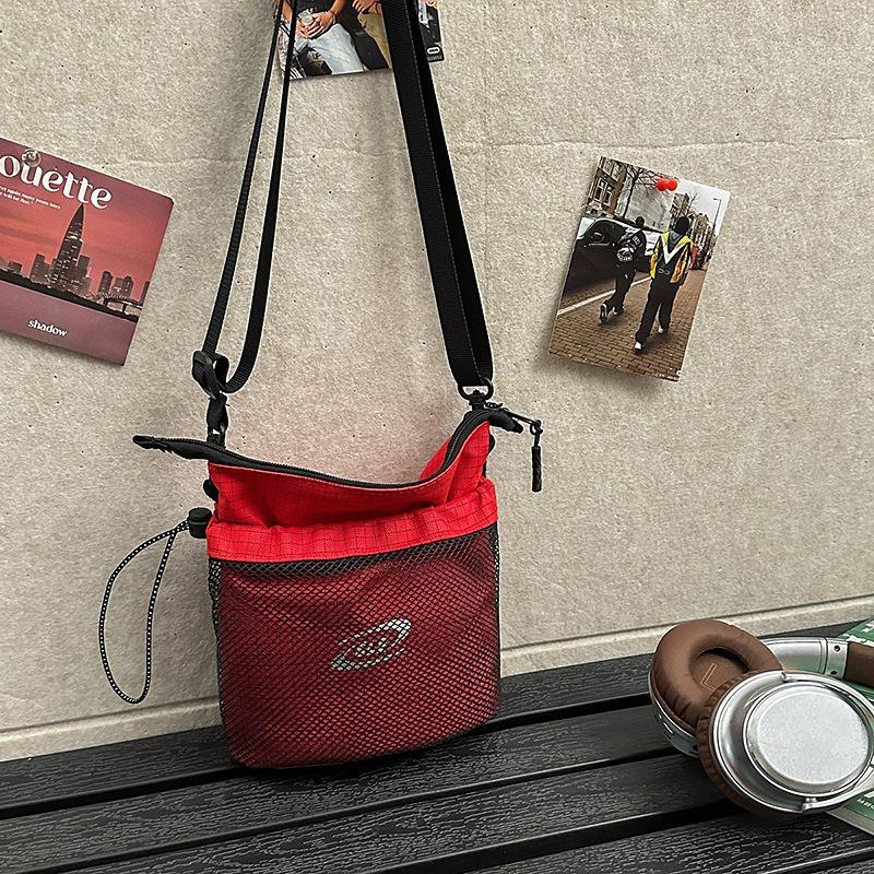 Casual messenger bag new fashion versatile commuter sports bucket shoulder bag women's mobile phone bag