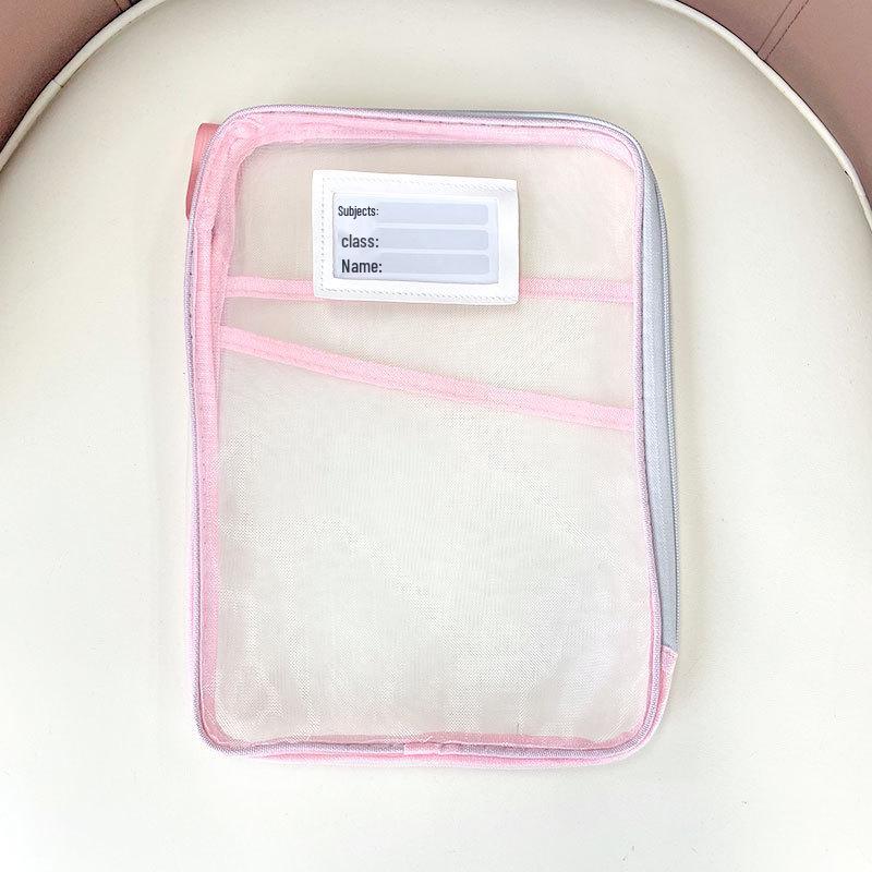 L-formad skolväska för att organisera ämnen för elever