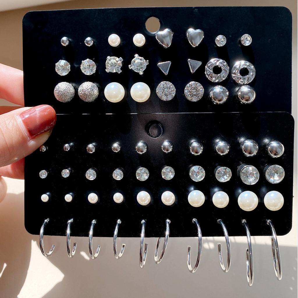 Hot-selling Retro Exaggerated Women's Peach Heart Stud Earrings Twist Twisted Pearl Earrings 11-piece Set of Earrings