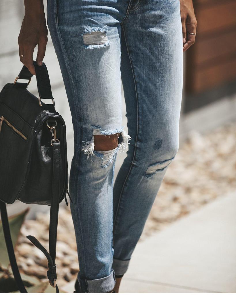 Women's Light Wash Stretch Ripped Mid-High Waist Jeans with 4-Button Design