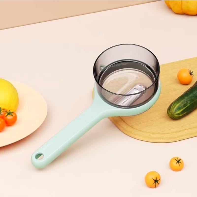 

Универсальная овощечистка для фруктов и овощей со встроенным отделением для хранения - зубчатое лезвие из нержавеющей стали, прочная пластиковая ручка для использования на кухне и в общежитии зелёный