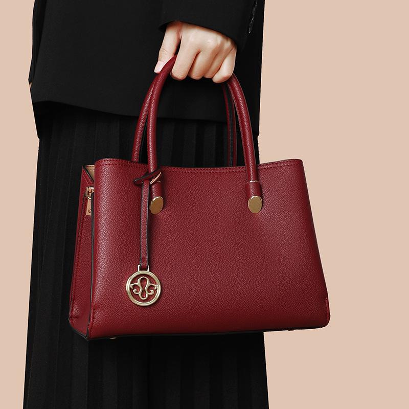 Elegant Red Mummy Bag: Fashionable, Spacious Handbag for Mother-of-the-Bride At Weddings