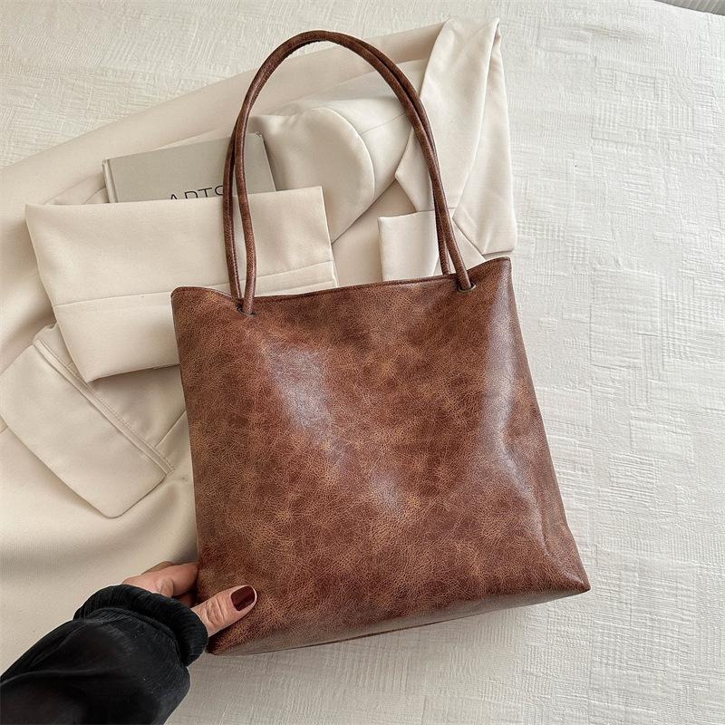 

Текстурированная большая ретро-сумка, весна 2025, новая универсальная сумка через плечо и подмышку, сумка-тоут коричневый