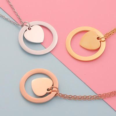 Trendige Partnerkette mit Herz- und Ringanhänger