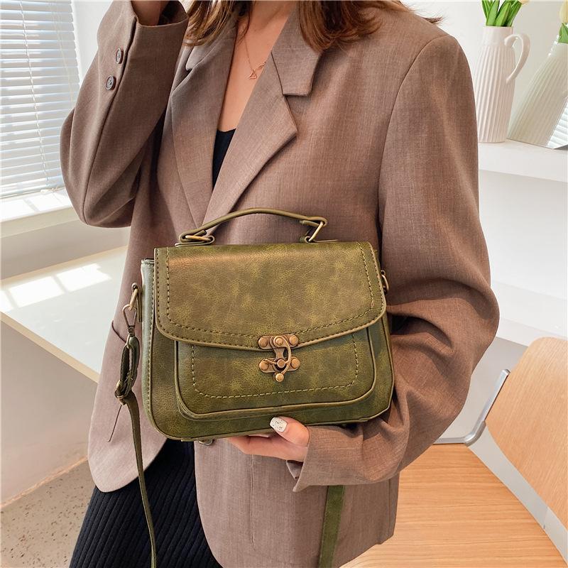 2025 new small square bag retro style portable bag retro lock popular women's bag simple small bag