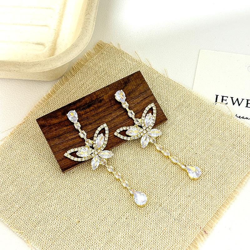 Lügong Elegant Long Zircon Tassel Earrings: Luxury Butterfly Studs for Women