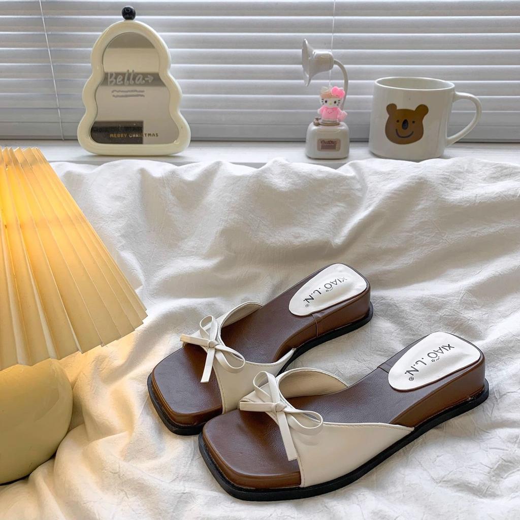 French temperament versatile bow one-word drag 2025 summer new with skirt fashionable height increase thick bottom cool slippers