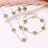 European Three-Piece Jewelry Set: Retro Black Gold Four-Leaf Clover Necklace, Earrings, and Bracelet