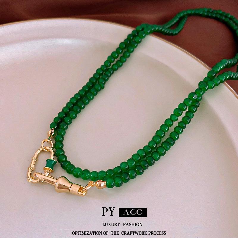 

Elegant Chinese Beaded Oval Necklace: Luxe, Fashionable Clavicle Chain for Women