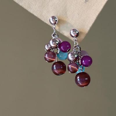 Silver Needle Cat's Eye Tassel Earrings: Chic, Fashionable, and Versatile Studs for Women.