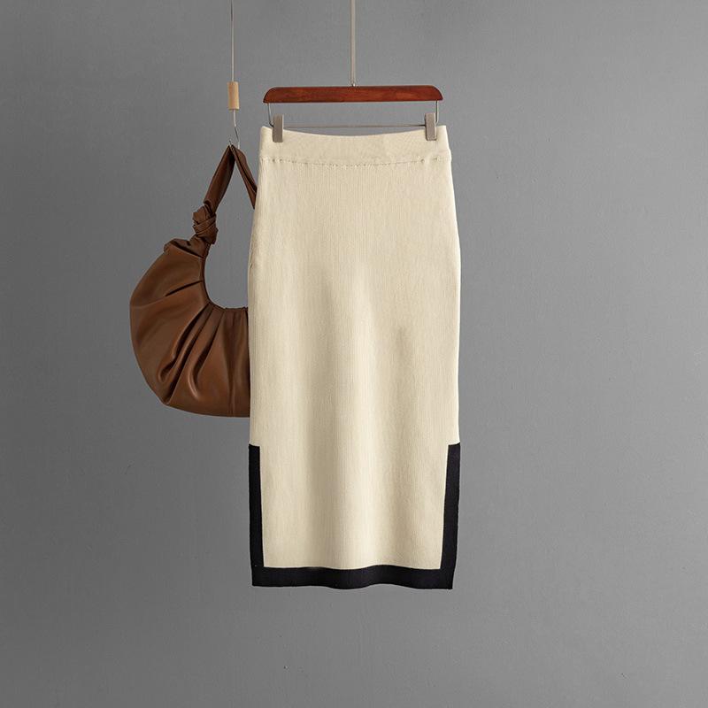 GMXIA Knitwear Set for Women's Autumn Design: A Two-piece Outfit Featuring A Contrasting Color Round-neck Top and A Slit Skirt, Exuding Elegance