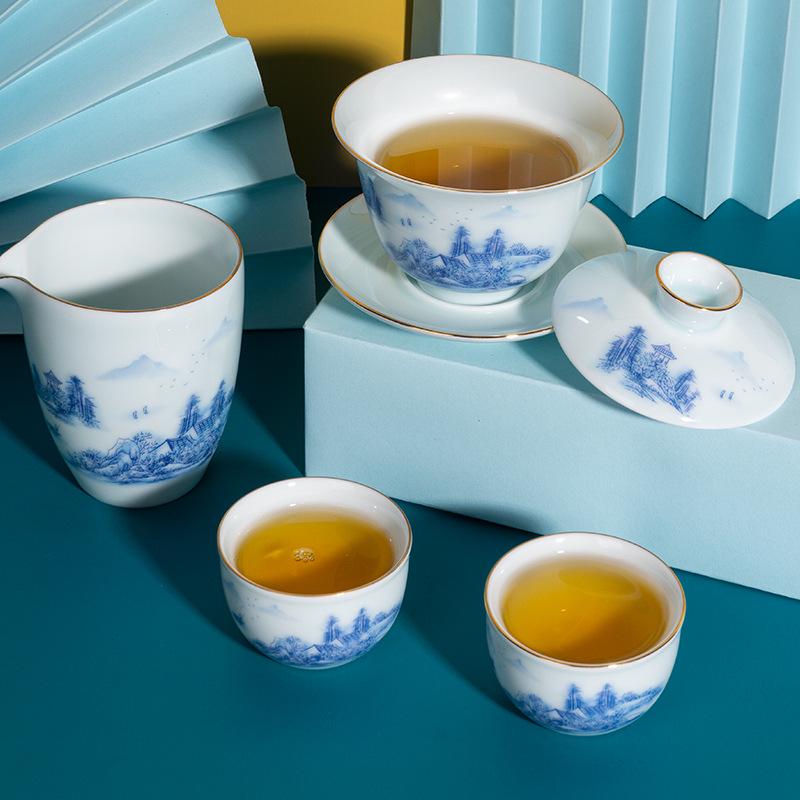 Celadon White Porcelain Tea Set with Gold Landscape: Complete Chinese Gaiwan Teapot and Teacup Set for Kung Fu Tea.