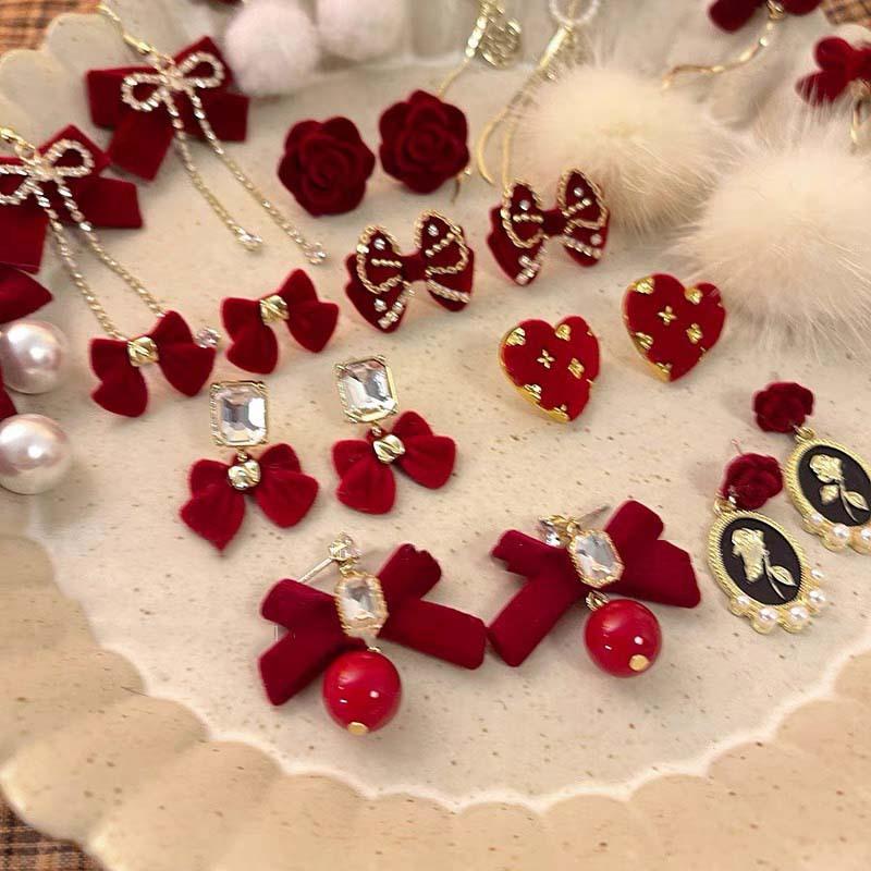 

Flocking red bow earrings autumn and winter new niche versatile earrings fashionable elegance temperament earrings women