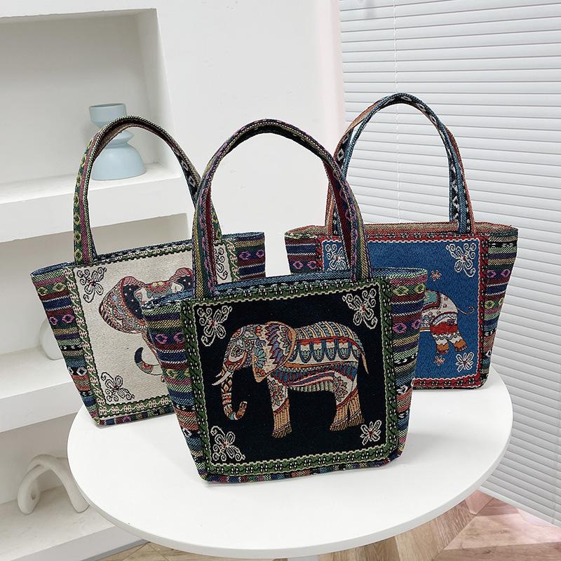 The Elephant Embroidery Double-sided Hand Shoulder Bag Is Versatile with Jacquard Patterns
