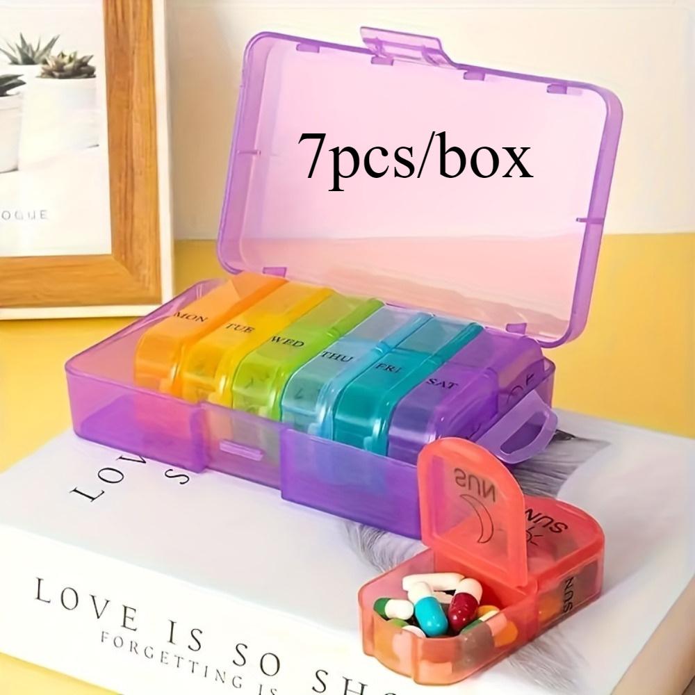 

7-Piece Pill Organizer Set. 2 daily compartments, transparent lids for convenient travel.