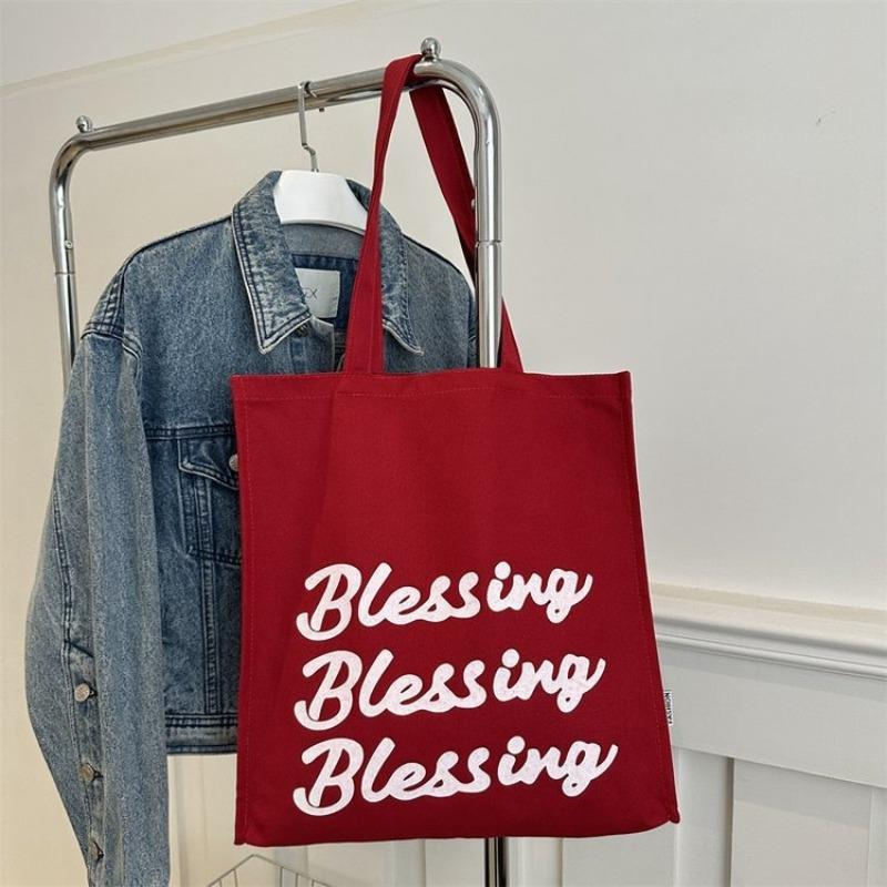 

Large capacity fashion trend alphabet canvas bag women s niche design new casual versatile tote bag one size fits all