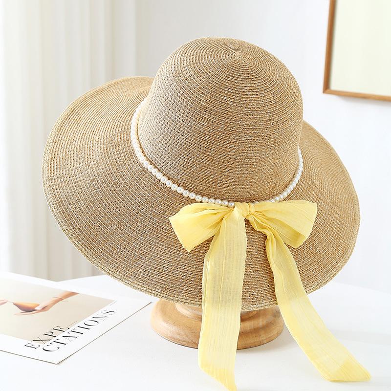 New pearl chain bow straw hat women's spring and summer big brim outdoor sunscreen hat vacation style travel sun hat