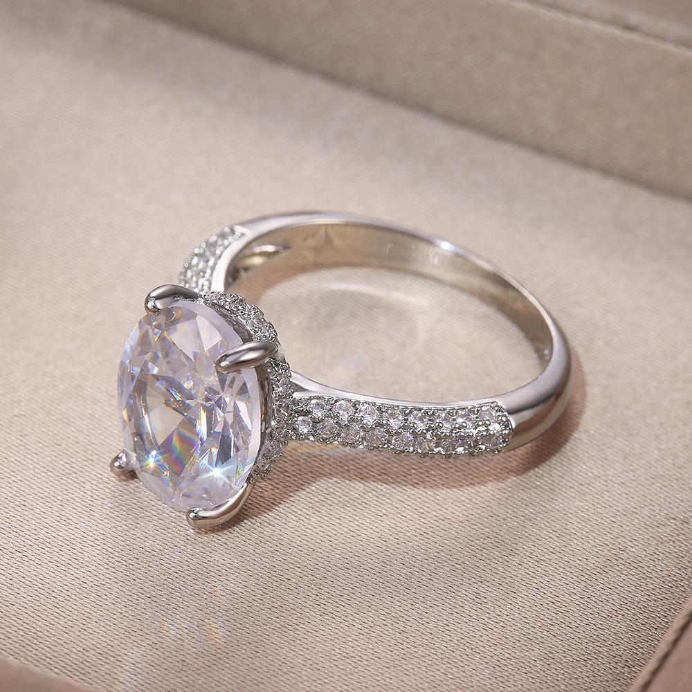 Ny Silverfärg Delikat Oval Cubic Zircon Stone Kvinnor Brudring för bröllop Förlovningsfest Bästa presenten till frun Klassiska ringar