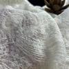 Retro patterned tattoo fabric with base of floral design suitable for wedding dresses formal gowns and designer clothing fabrics