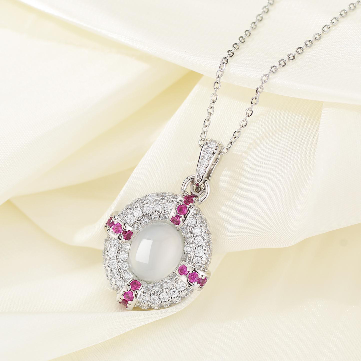 Stylish Oval Red Corundum Necklace with Diamond-Studded Egg Surface