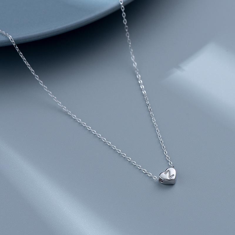 S925 Silver Heart-Shaped Initial Necklace - Korean Style Clavicle Chain with Trendy Peach Heart Design.