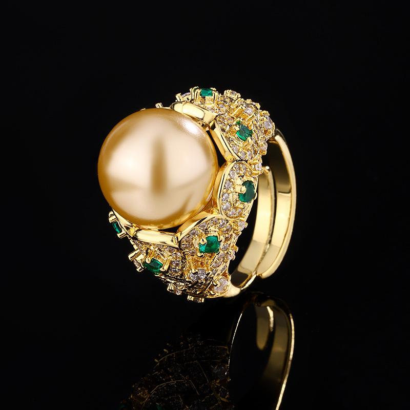 

Ювелірні вироби Інкрустоване золото Біла намистина Світле золото Ретро Кільце з інкрустацією діамантами 14 мм